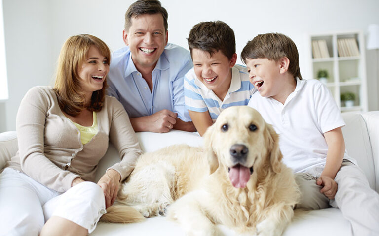 family spending time with dog